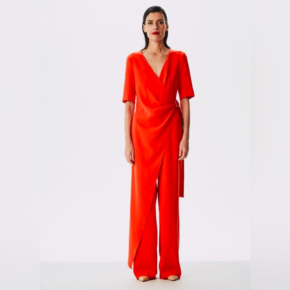 Adolfo Dominguez jumpsuit. Bright Orange Red. This has the look of a dress.